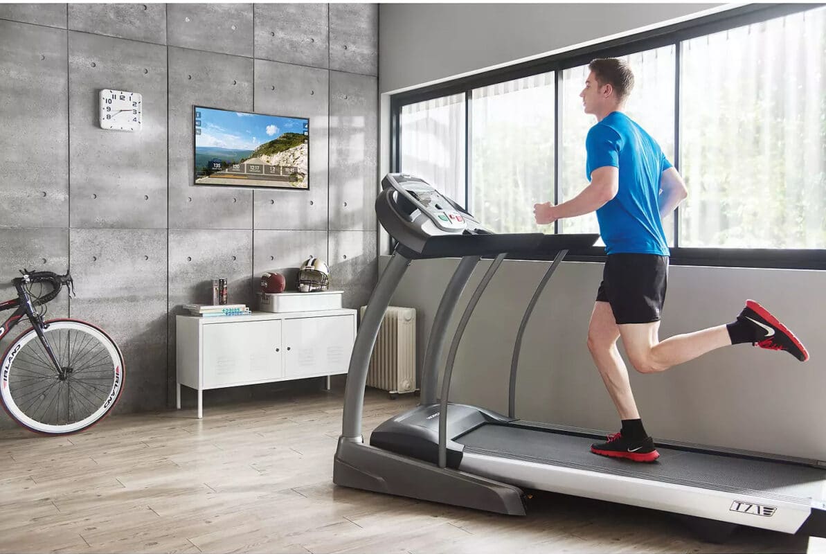 Horizon T7.1 Folding Treadmill man running in studio