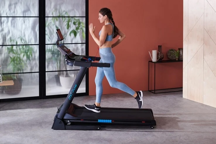 JTX Sprint-3 Electric Treadmill woman working out