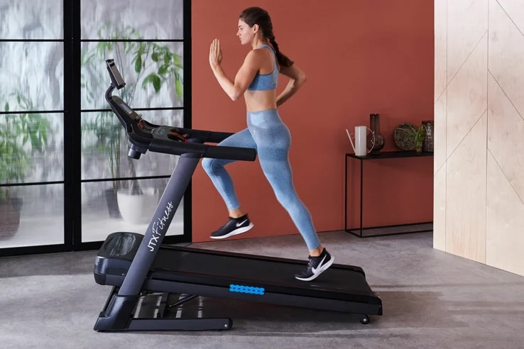 JTX Sprint-7 Large motorised Treadmill woman running