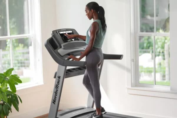 Nordictrack Commercial 2450 Treadmill woman working out