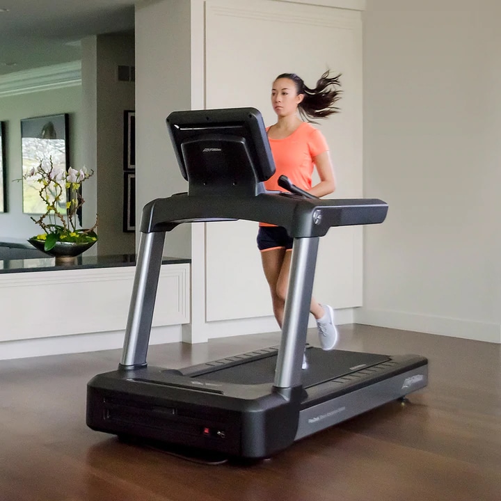 Life Fitness Club Series+ Treadmill woman running