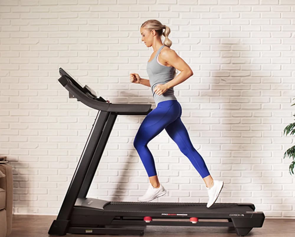 ProForm Carbon TL Folding Treadmill woman running