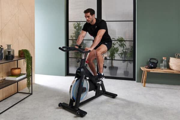 JTX Cyclo 6 Exercise Bike - with a male model exercising