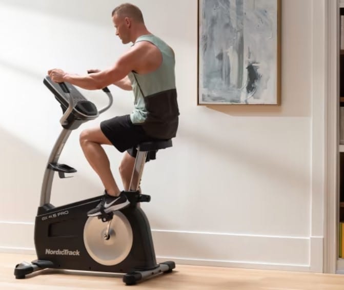 NordicTrack GX 4.5 Pro Exercise Bike - with a male model exercising 