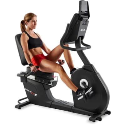 Sole LCR Recumbent Exercise Bike - with a female model