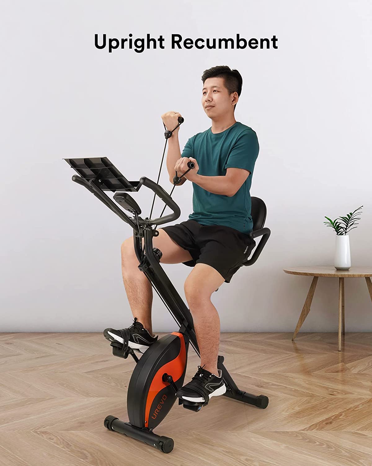 UREVO Foldable Exercise Bike - with a male model exercising 