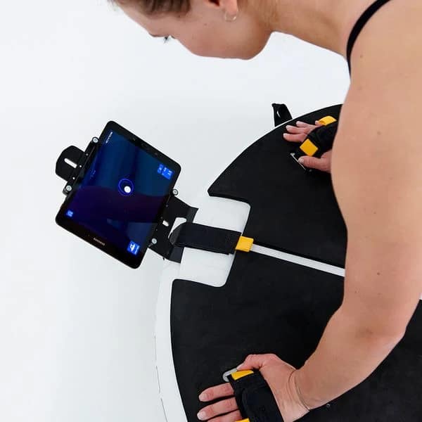 ICAROS Cloud 360 VR Fitness Equipment - with a female model using a tablet