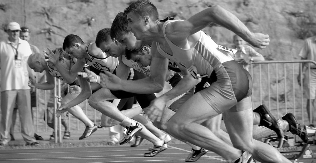 Athletes Running on Track