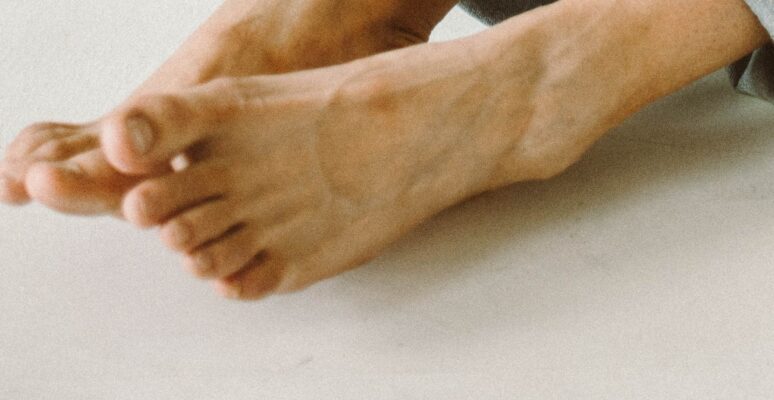 A Woman Reaching her Toes