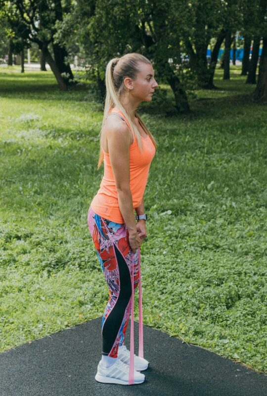A Woman Using a Resistance Band
