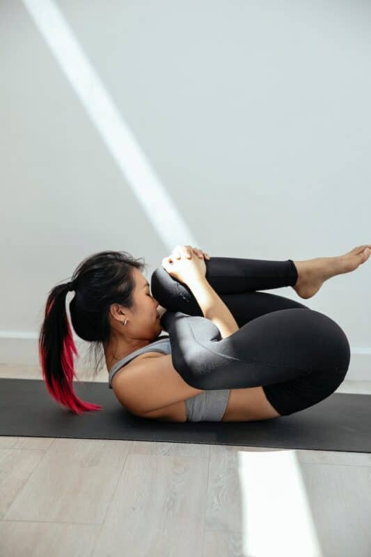 woman stretching her hamstring